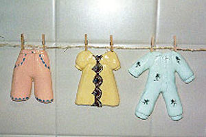 Laundry room clothesline relief tiles