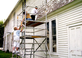 Arthritis sufferer working on a scaffold.