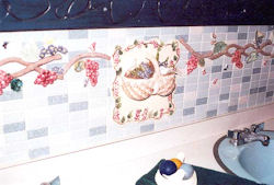 Bathroom backsplash with birds in a basket