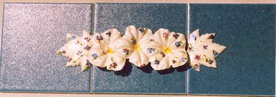 Flowers on 6 inch tile relief