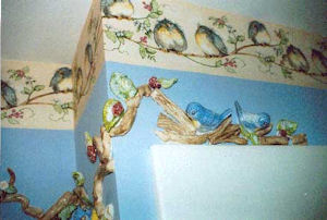 Birds on branches corner wall relief.