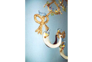 Birds on branches wall hooks.