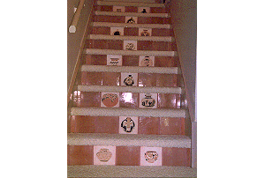 Stairs with Pueblo pot design tiles on the risers.